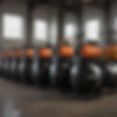 Diverse air compressors lined up in a workshop setting