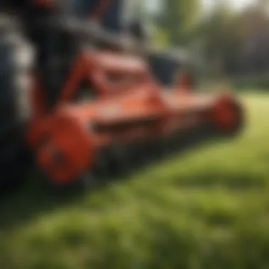 Close-up view of power rake tines engaging with grass