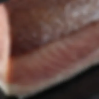 A close-up view of a cod fillet, highlighting its texture and quality.