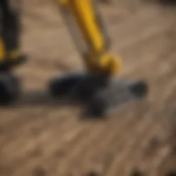Detailed view of Gehl mini excavator tracks
