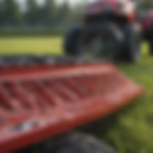 Close-up view of Mahindra finish mower blade design