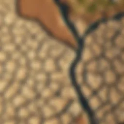 Aerial view of a dried-up riverbed indicating freshwater scarcity