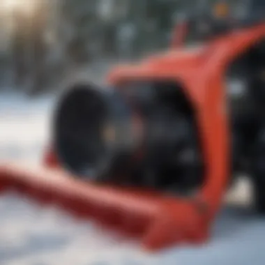 Close-up of rear mounted snow blower's design features