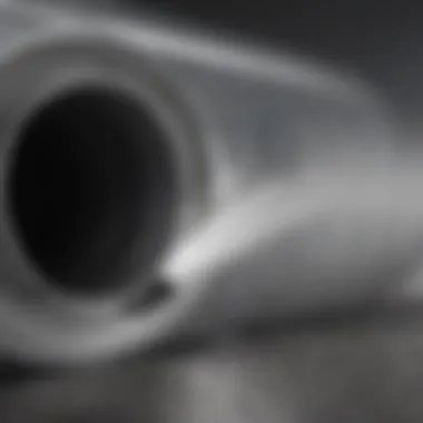 Close-up of air duct with cleaning spray application