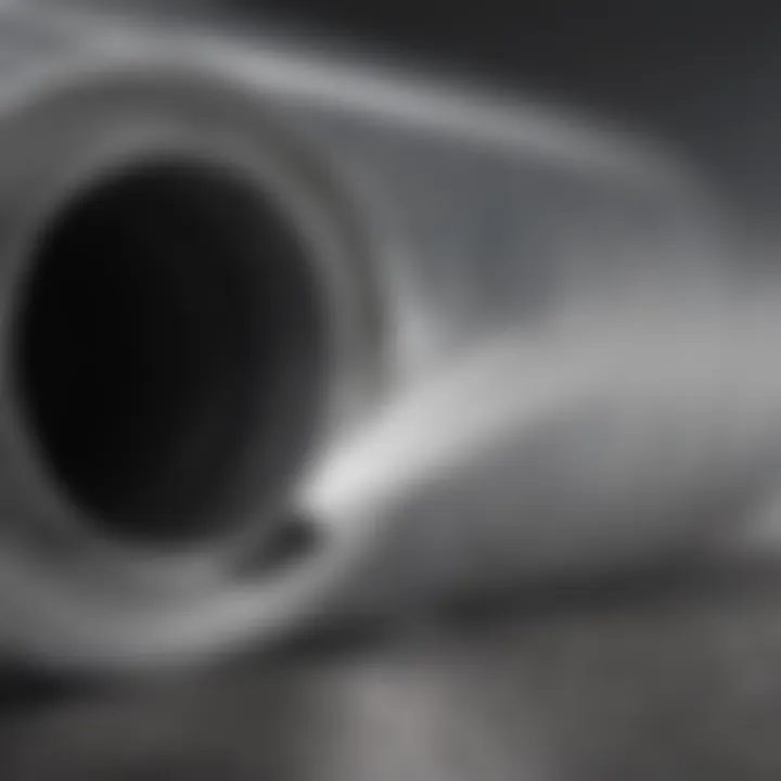 Close-up of air duct with cleaning spray application